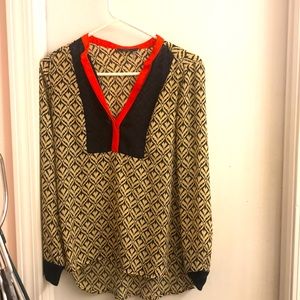 Printed blouse with red orange accent